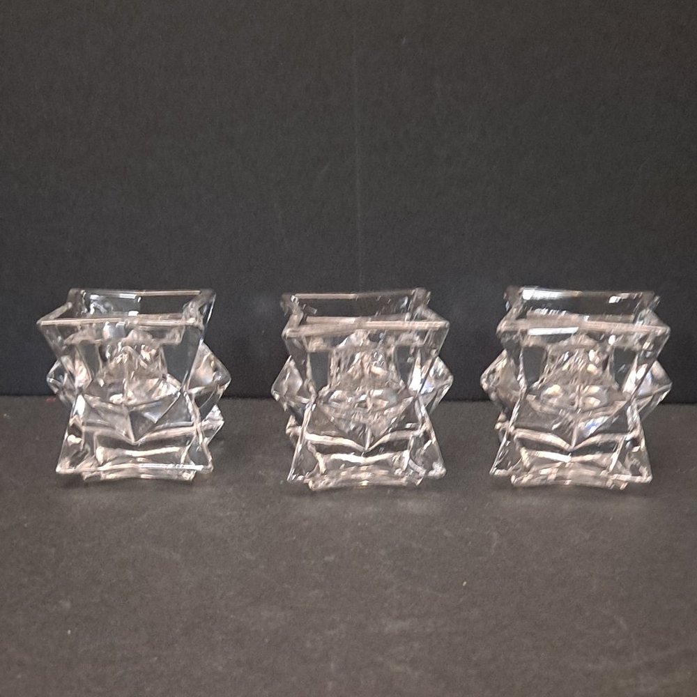MIGHT BE CRYSTAL CANDLE HOLDERS.